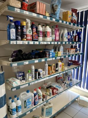 many bottles of cleaning products on the shelves in the store