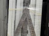 a sign that has been wrapped up on a pallet