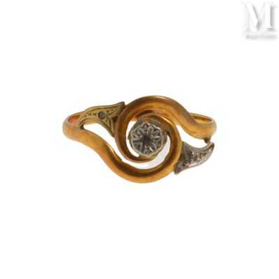 une image d'une bague en or avec un diamant au milieu