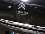 a black car with a citroen logo on it