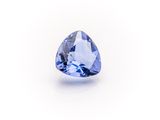 a blue sapphire stone on a white background