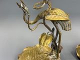 pair of brass candlesticks in the form of a frog and a lily