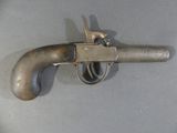 a gun that is sitting on a table