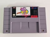 a close up of a nintendo game on a white surface