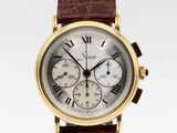 a close up of a wrist watch with roman numerals on it