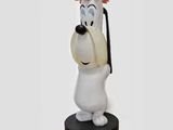 the statue of a dog is holding a baseball bat on a white surface