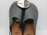 an image of a pair of shoes with an umbrella on top of them