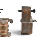 two different types of pipe holders on a white background