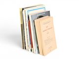a stack of books sitting on top of each other