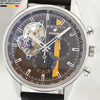 a close up of a wrist watch with a black dial