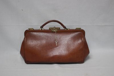 vintage brown leather handbag with brass hardware