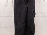 a mannequin mannequin wearing black pants on a mannequin mannequin mannequin mannequin mannequin mannequin manne
