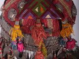 an image of a colorful hat with tassels on it