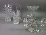 a lot of glass items that are sitting on a table