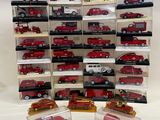 a lot of red and white model cars in display cases