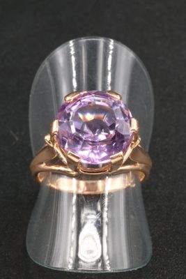 an image of a ring with an amethorate stone in it