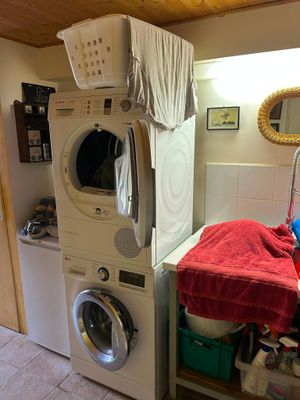 a washer and dryer in a small room