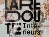a bag of fabric with a label on it that says larbe dou