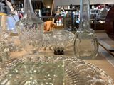 a table with a lot of glass items on it