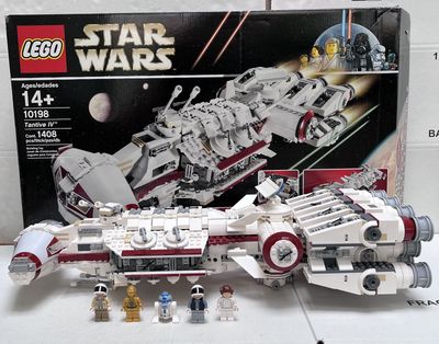 a box of lego star wars sets on a table