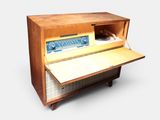 a computer desk with a mouse on top of it