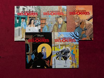 quatre livres posés sur une surface rouge