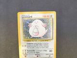 a close up of a pokemon card on a table
