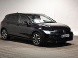 a black volkswagen vw tourer parked on a checkered floor