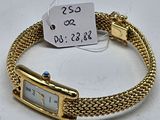 an image of a gold bracelet with a white mother of pearl dial