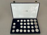 an image of a box of silver coins on a table