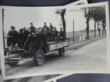 several old black and white photos of a group of men riding in a truck