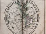 un livre ouvert sur lequel figure une carte du monde
