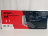 the box is open on a white table with a red and black background