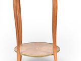 a wooden table with a marble top on a white background