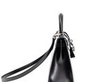 a small black purse with a strap on it