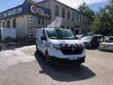 a white van that is parked in front of a building