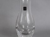 an image of a clear glass vase on a table