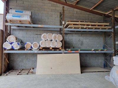 a room that has a lot of shelves and a lot of items on it