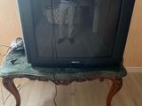 a television that is sitting on top of a table