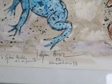a picture of a painting of a blue frog on the wall