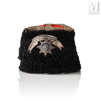 an image of a black hat with a badge on it