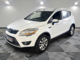 a white ford kuga is parked in a room with a checkered floor