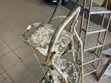 a picture of a ladder that is sitting on a tile floor