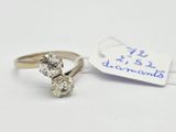 a close up of a diamond ring with a price tag on it