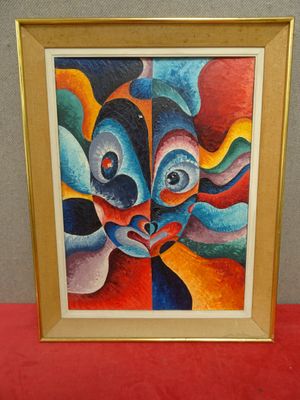 an image of a painting of a woman ' s face in a gold frame