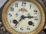 a clock that is sitting on top of a table