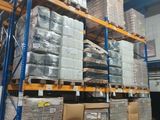 a lot of boxes on the shelves in the warehouse