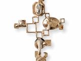 an image of a cross made out of metal with a face on it