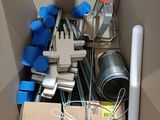 a box full of assorted items and tools in it