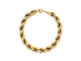 un bracelet en corde dorée sur fond blanc